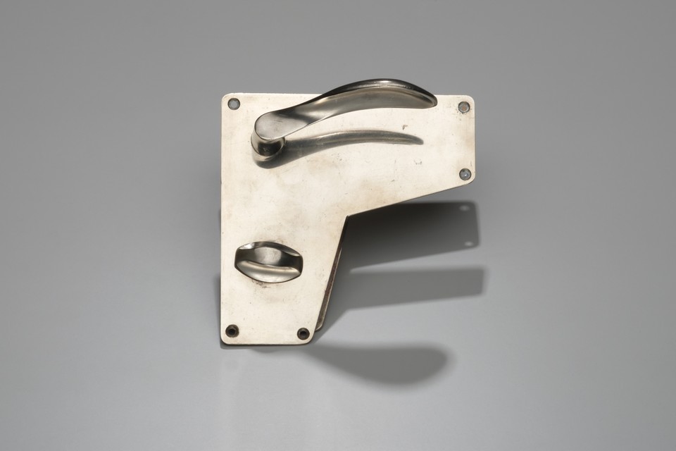 Arne Jacobsen – Set of Five Early 'AJ' Door Handles and Lock