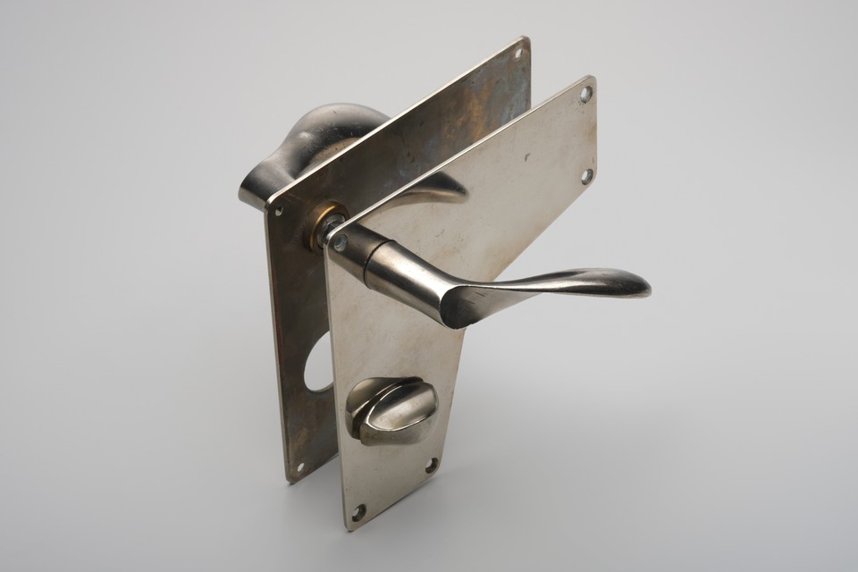 Arne Jacobsen – Set of Five Early 'AJ' Door Handles and Lock
